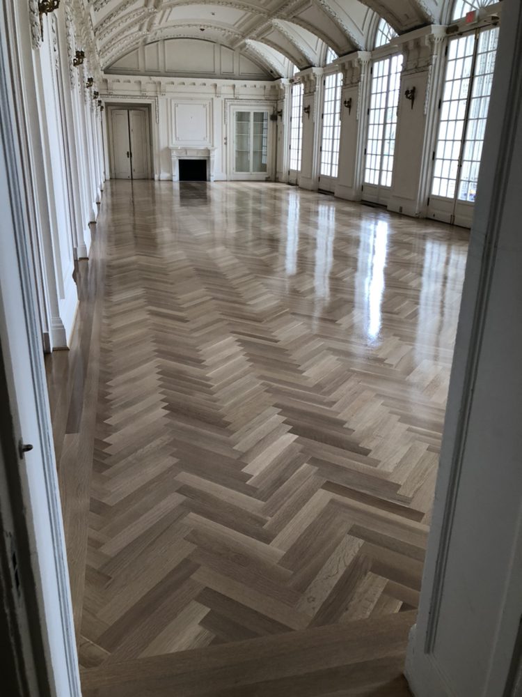 Herringbone white oak flooring in a luxury living room