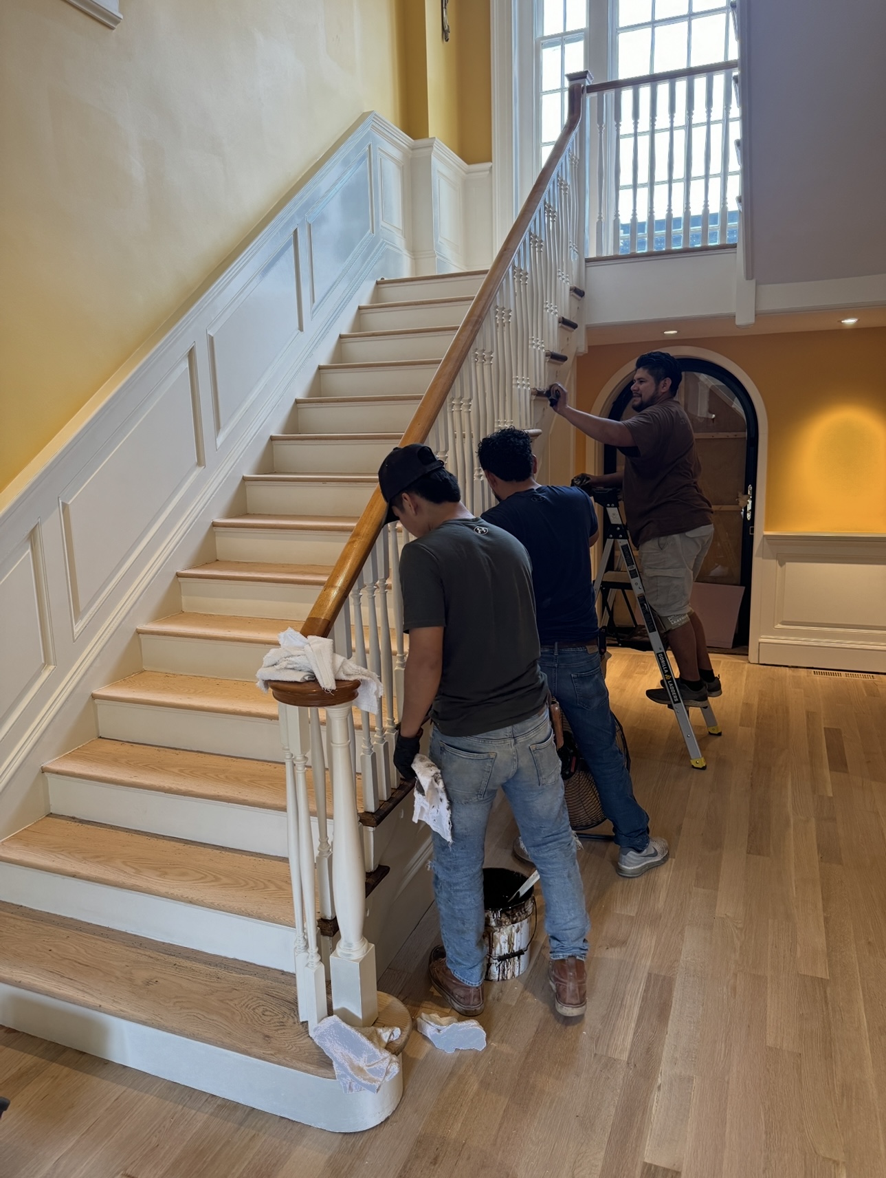 Restored dark walnut floor with matching staircase